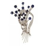 A SAPPHIRE AND DIAMOND SPRAY BROOCH, C1970 in palladium ++In good condition