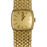 AN OMEGA 18CT GOLD LADY'S WRISTWATCH NO 28061885 calibre 484, maker's tapered mesh bracelet and