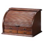 A MAHOGANY STATIONERY BOX, C1900 the fitted interior enclosed by a tambour shutter, 34cm h; 33 x