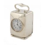 A VICTORIAN SILVER MINIATURE BALE SHAPED CARRIAGE CLOCK with French movement, 9cm h, by H