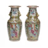 A PAIR OF CANTON FAMILLE ROSE VASES, MID 19TH C 24cm h ++Slight wear to the gilding on the applied