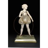 FERDINAND PREISS A HOOP GIRL, C1925 Cold painted bronze and ivory on onyx base, 20cm h, signed on