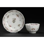 A CALCUT POLYCHROME FLUTED TEA BOWL AND SAUCER, C1794-96 saucer 13cm diam Provenance: Aurea