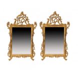 A PAIR OF ROCOCO STYLE GILTWOOD MIRRORS, 20TH C 147cm h, 90cm w ++Undamaged, the gilding rubbed in