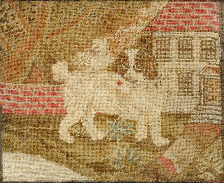 A REGENCY WOOLWORK PICTURE OF A SPANIEL, C1820-30 28 x 34cm, ebonised cavetto frame ++Long