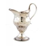 A GEORGE III SILVER ENGRAVED OGEE CREAM JUG crested, 12cm h, by Samuel Meriton, London 1786, 2ozs