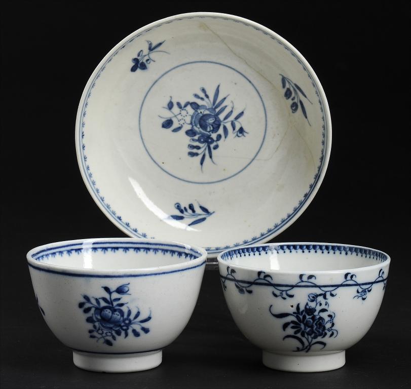 A CAUGHLEY BLUE AND WHITE TEA BOWL AND TEA BOWL AND SAUCER, C1779-88 printed with the Trailing