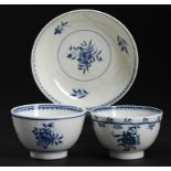 A CAUGHLEY BLUE AND WHITE TEA BOWL AND TEA BOWL AND SAUCER, C1779-88 printed with the Trailing