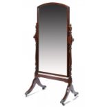 A VICTORIAN MAHOGANY CHEVAL MIRROR, LATE 19TH C with broken line inlay and brass paw castors,