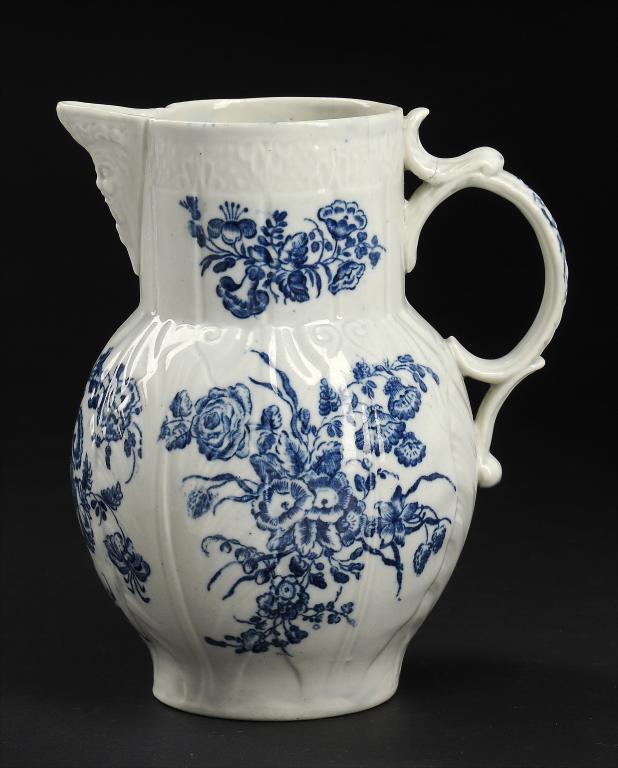 A CAUGHLEY BLUE AND WHITE MASK JUG, C1779-88 printed with the Bouquets pattern, 18.5cm h ++Cracked