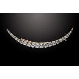 A DIAMOND CRESCENT BROOCH, LATE 19TH C ++Stone clean and bright, the brooch slightly bent