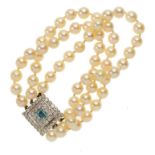 A CULTURED PEARL THREE STRAND BRACELET, C MID 20TH C of approx 7mm cultured pearls with