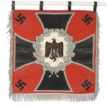 A GERMAN THIRD REICH WEHRMACHT TRUMPET BANNER of heavy red silk, obv. applied with iron cross, eagle