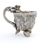 A CHINESE SILVER REPOUSSÉ CUPWITH CAST AND CHASED DRAGON HANDLE, C1859 the shield cartouche engraved