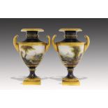 A PAIR OF ROYAL WORCESTER VASES, 1917 finely painted by H Davies, both signed, with a landscape