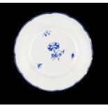 A CAUGHLEY BLUE AND WHITE MOULDED PLATE, C1790 painted with the Carnation pattern, 21cm diam,