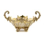 A GEORGE V SILVER GILT CHASED AND LOBED BON BON DISH 16cm over handles, by The Goldsmiths &