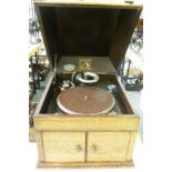 AN HMV OAK TABLE GRAMOPHONE