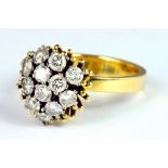A DIAMOND CLUSTER RING,  IN 18CT GOLD, 7.5G