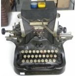 AN OLIVER TYPEWRITER CO NUMBER NINE TYPEWRITER AND A VINTAGE PORTABLE TYPEWRITER