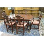 A GEORGE III STYLE MAHOGANY DINING TABLE AND SET OF SIX CHAIRS