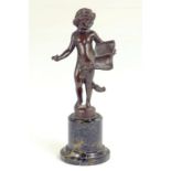 A CONTINENTAL MINIATURE BRONZE STATUETTE OF A CHILD, ON TURNED SERPENTINE PLINTH, 19TH CENTURY