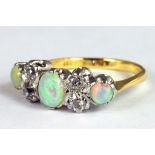 A DIAMOND AND OPAL RING, IN GOLD MARKED 18CT P, 3G