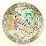 A JAPANESE PORCELAIN PLAQUE, PAINTED IN CANTON STYLE WITH LADIES AND BOYS BY A TABLE, IN GILT