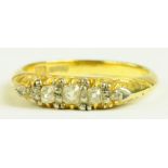 A DIAMOND FIVE STONE RING, WITH CUSHION SHAPED OLD CUT DIAMONDS IN GOLD, MARKED 18CT, 3.8G