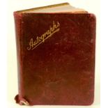 AN EARLY 20TH CENTURY AUTOGRAPH ALBUM CONTAINING WATERCOLOUR ILLUSTRATIONS IN THE MANNER OF LOUIS