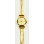 A ZENITH GOLD LADY'S WRISTWATCH, THE BRACELET MARKED 750, 18.6G GROSS