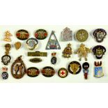 A COLLECTION OF BRITISH ENAMELLED BASE METAL BADGES