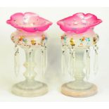 A PAIR OF VICTORIAN CRANBERRY SHADED OPAL GLASS ENAMELLED LUSTRES