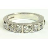 A DIAMOND SEVEN STONE RING, WITH SQUARE SET OLD CUT DIAMONDS IN PLATINUM, 7.7G