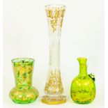 A GREEN GLASS VASE AND SIMILAR JUG, RICHLY DECORATED AND RAISED GILDING AND A SIMILAR CUT GLASS