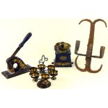 A WROUGHT IRON WALL SCONCE, A VICTORIAN IRON AND BRASS COFFEE MILL, A BLACK AND GILT JAPANNED