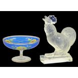 A 1930'S FROSTED GLASS MODEL OF A COCKEREL IN LALIQUE STYLE AND A CUT AND ENAMELLED GLASS TAZZA WITH