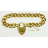 A 9CT GOLD CURB BRACELET AND PADLOCK, 40.7G
