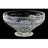 A FINE CUT GLASS BOWL, CUT AND ENGRAVED WITH CONTINUOUS WATERLILIES ON RIPPLING WATERS, ON STAR