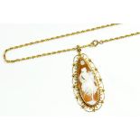 A TEAR SHAPED CAMEO PENDANT, IN 9CT GOLD AND A GOLD NECKLET, 13.4G GROSS