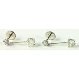 A PAIR OF ROUND BRILLIANT AND HEART SHAPE DIAMOND EARRINGS IN WHITE GOLD, FULLY ARTICULATED,