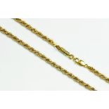 A TWO COLOUR GOLD ROPE NECKLACE WITH BASE METAL CLASP, 29.8G GROSS