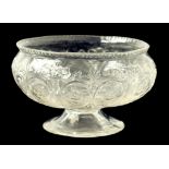 A 'ROCK CRYSTAL' GLASS LOBED BOWL ON FLARED FOOT, ENGRAVED WITH A REPEATING DESIGN OF FLOWERS AND