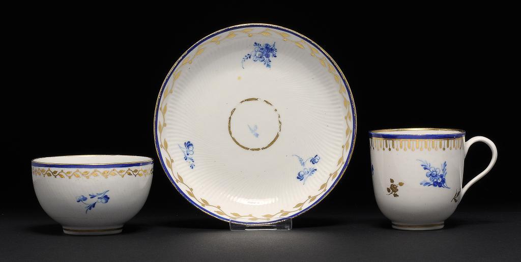 A DERBY TEA BOWL AND SAUCER AND COFFEE CUP, C1780-84 with dry blue decoration, saucer 13.5cm diam,