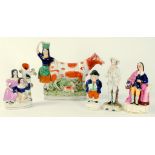 FIVE 19TH CENTURY STAFFORDSHIRE EARTHENWARE FIGURES AND GROUPS