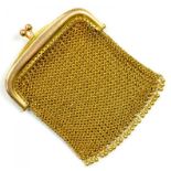 A GOLD AND GOLD MAIL PURSE, MARKED 9CT, 31.6G