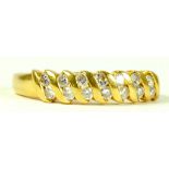 A DIAMOND FOURTEEN STONE RING IN GOLD, MARKED 18CT, 2.4G