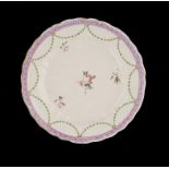 A DERBY PURPLE AND MAUVE BORDERED PLATE, C1778-81 23.5cm diam, crown over D in blue ++ Slight wear