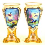 A PAIR OF FRENCH PORCELAIN VASES PAINTED WITH A PANEL OF BIRDS, ON THREE GILT PAW FEET, LATE 19TH