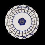 A DERBY BLUE AND GILT SCALLOPED PLATE, C1777-84 20 diam, crown over D in blue ++ Gilding on rim worn